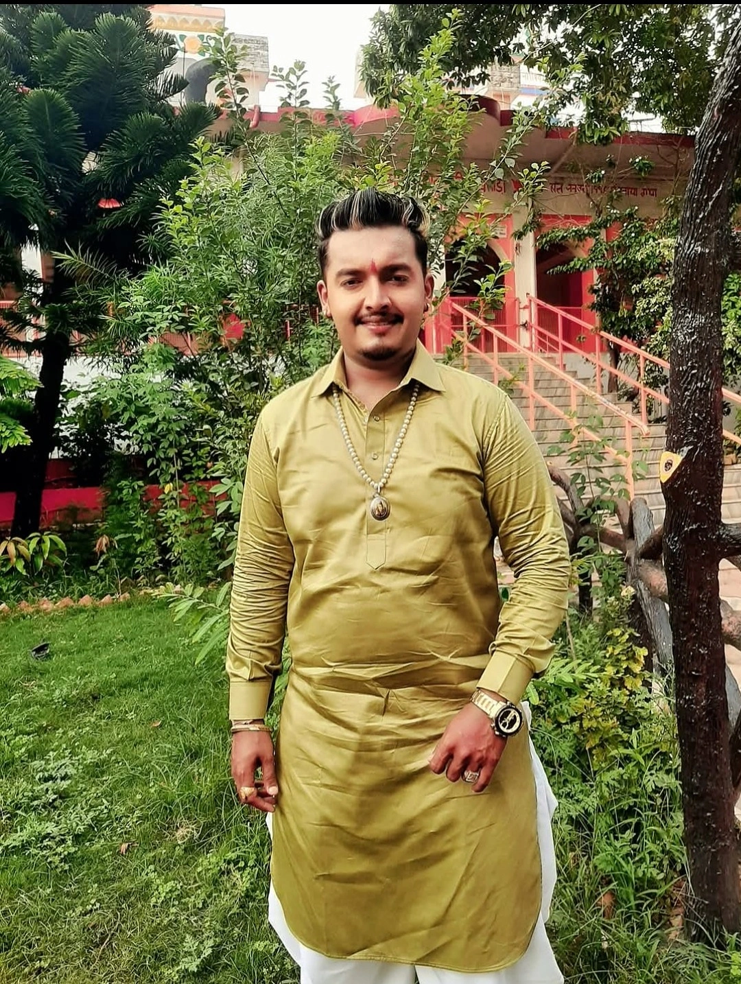 Sidhu Badshah (Gurpreet Singh) in golden traditional kurta