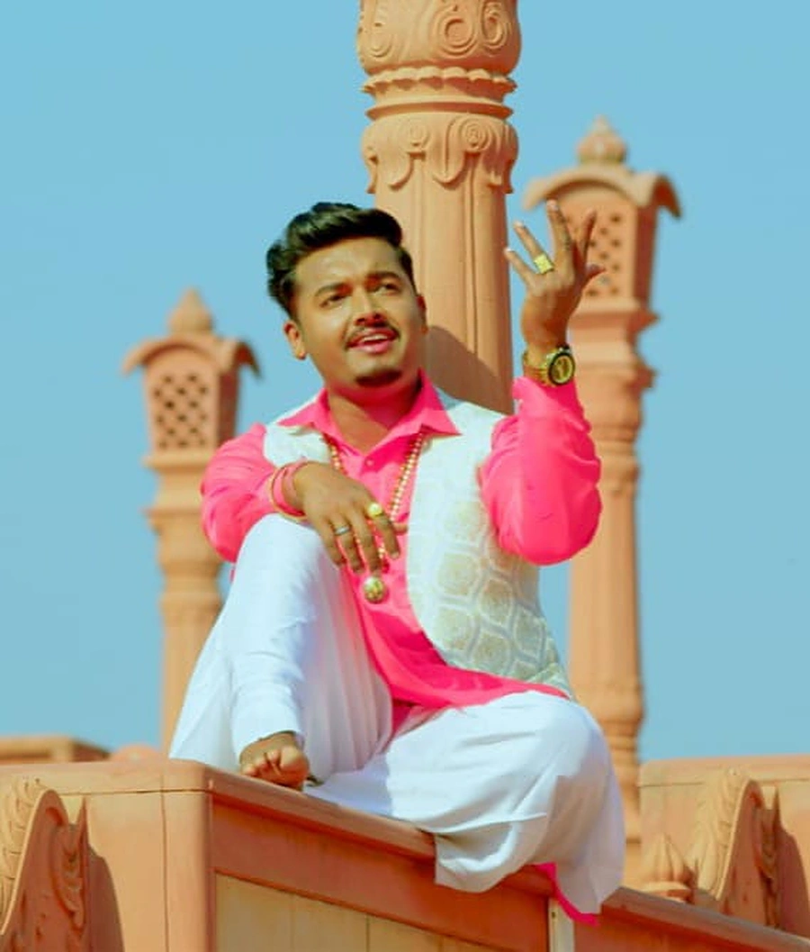 Sidhu Badshah Punjabi singer in pink traditional outfit